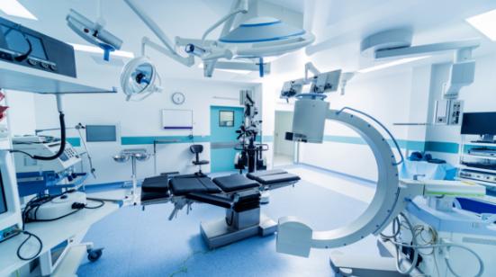 Empty hospital operating room with imaging equipment